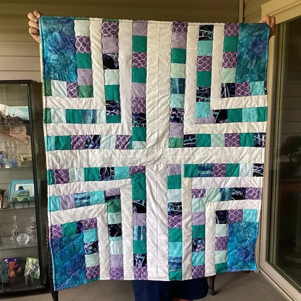 NWT. Hand Crafted Quilt of Blues, Purples and Turquoises